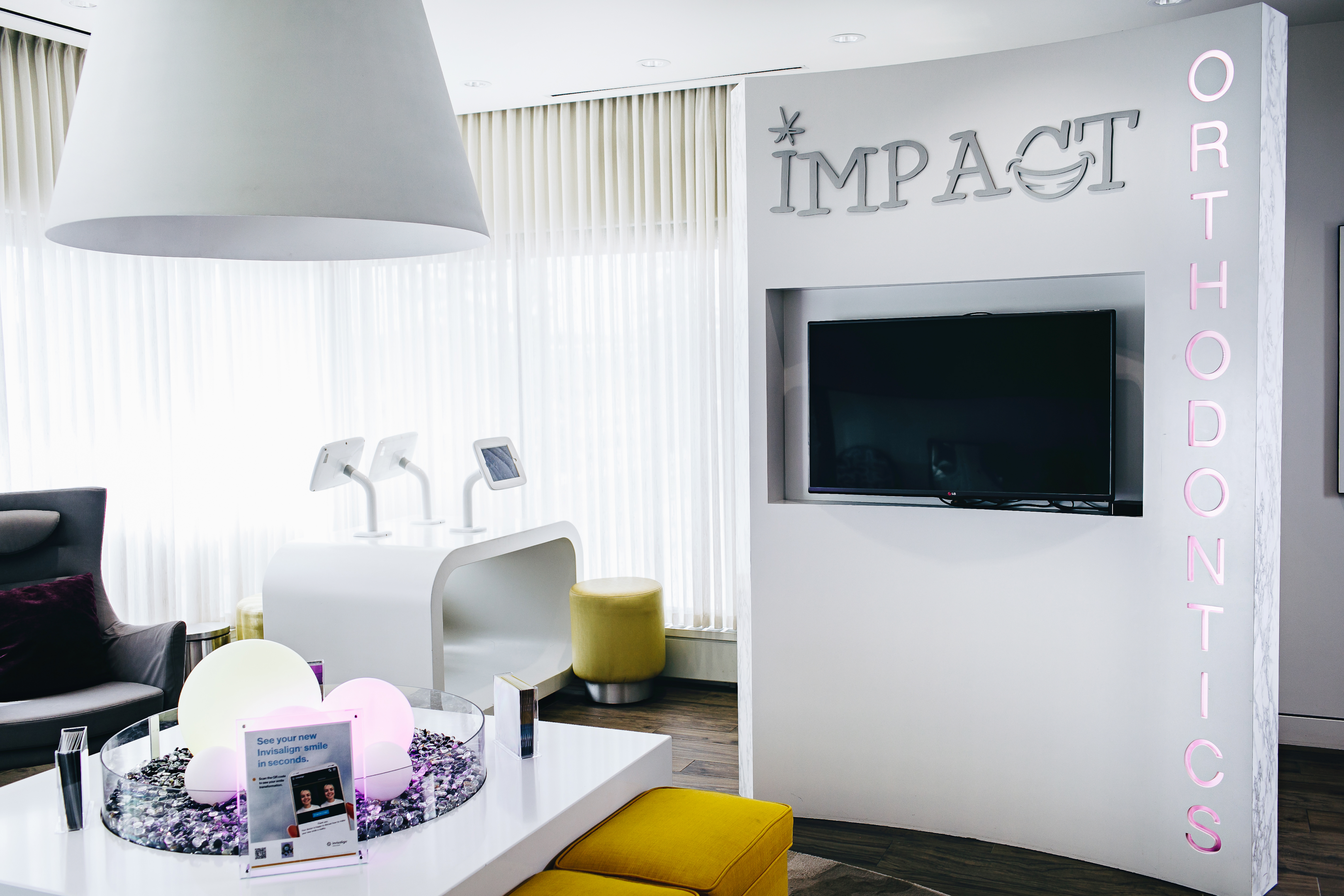 patients smile when they get braces at impact orthodontics in Calgary