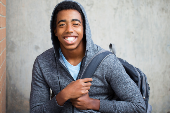 teen wearing Invisalign for a vertical overbite