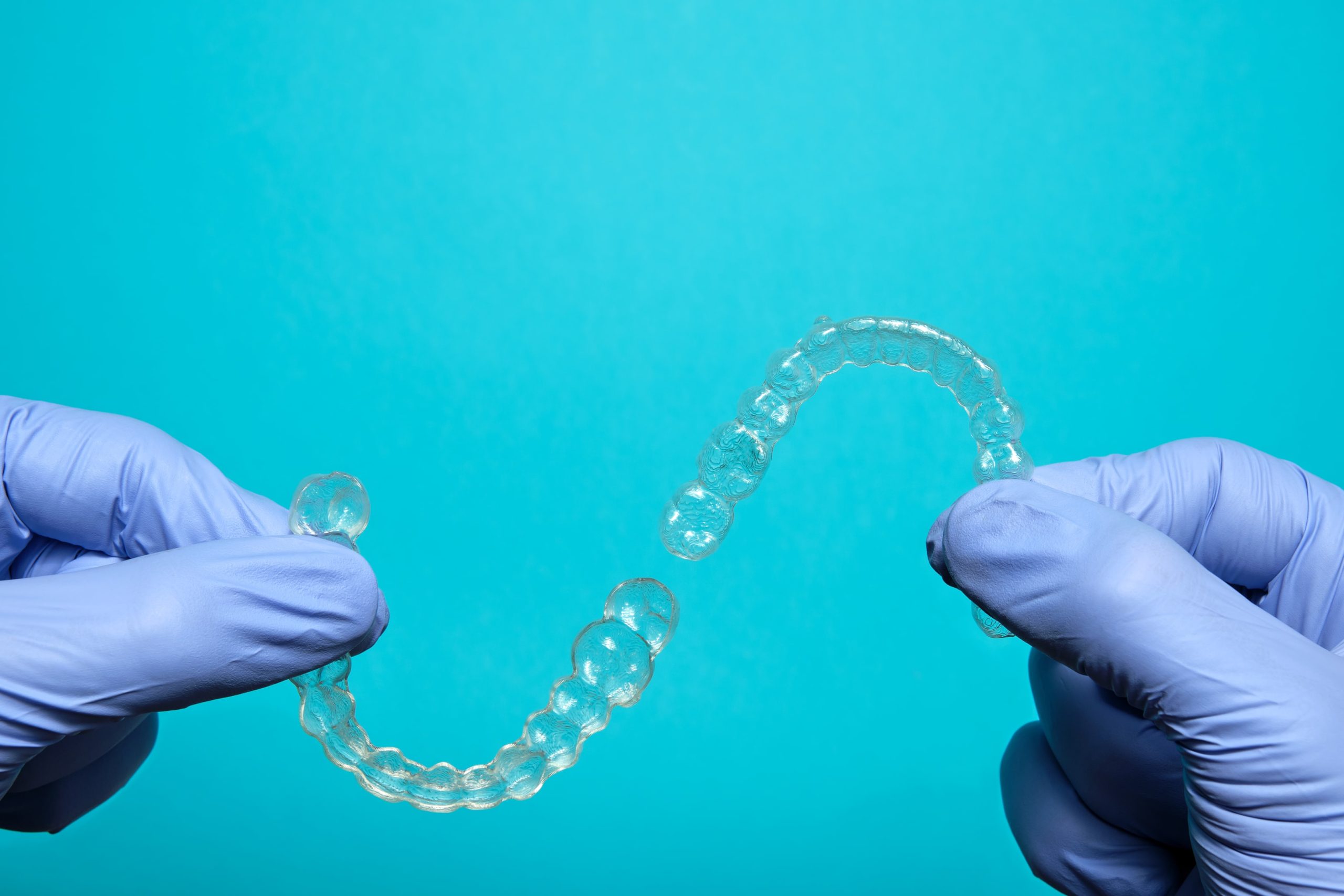 Clear aligners that might be used, once a child has lost all their baby teeth, to correct crooked teeth or bite