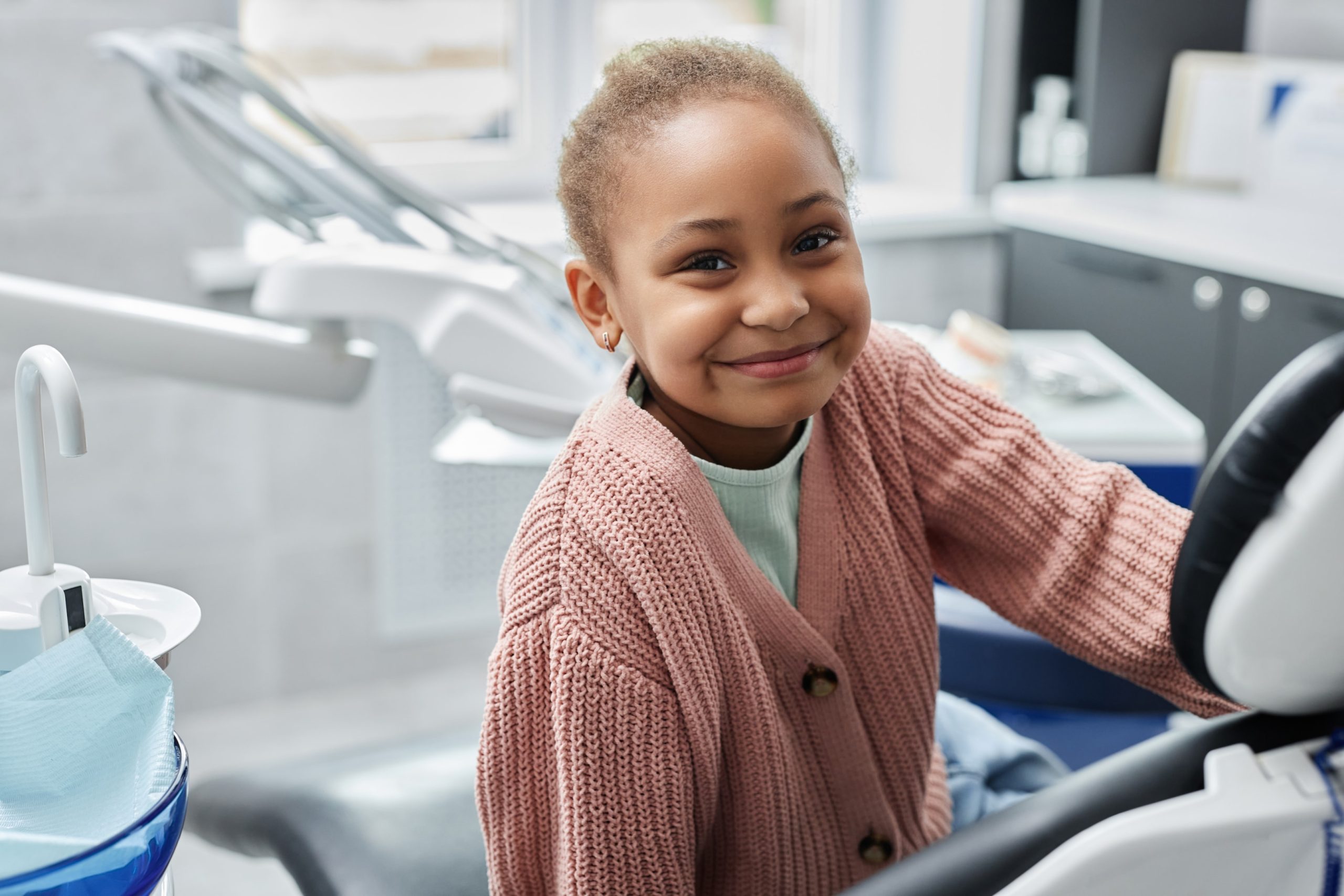 Girl waiting in a patient chair for her consultation