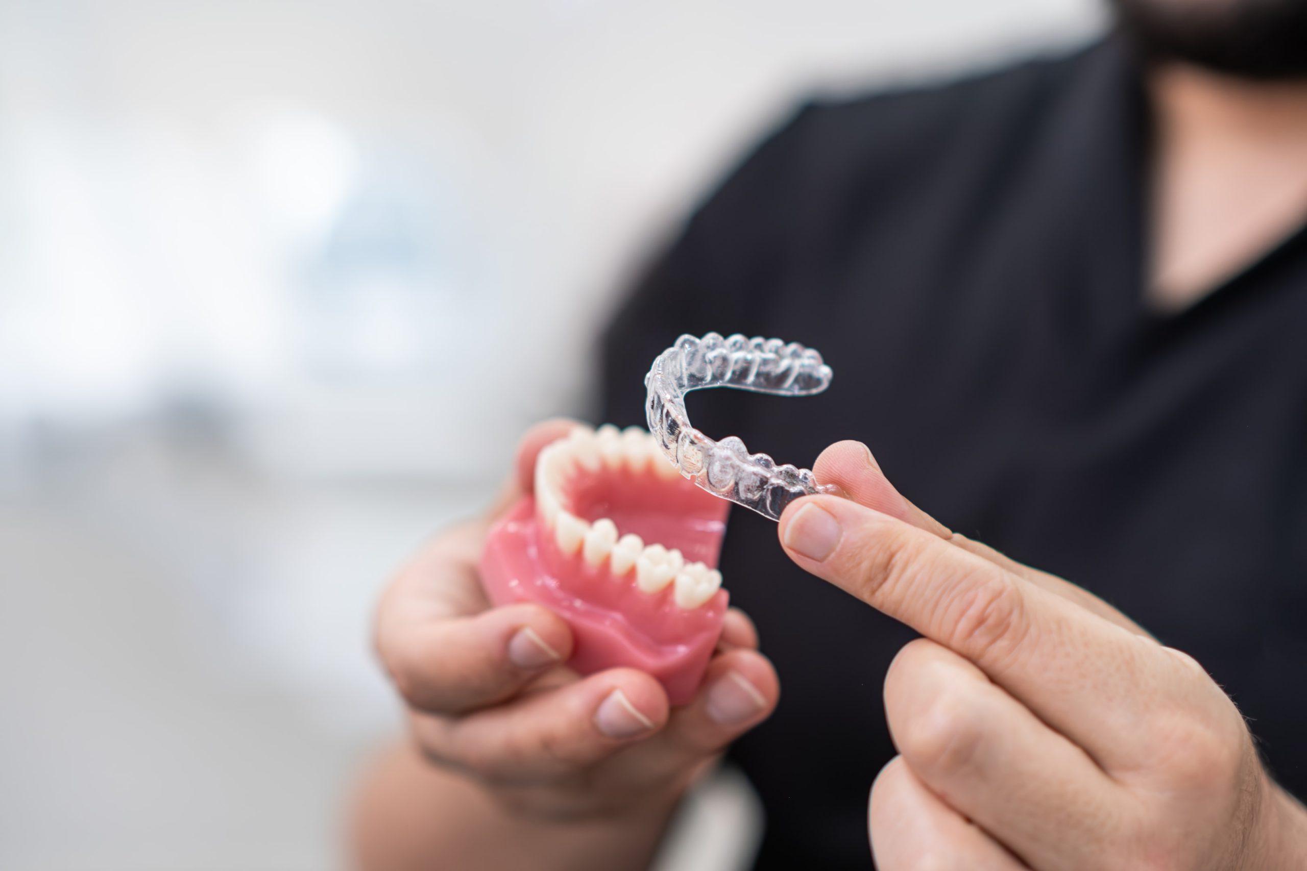 Dental model wearing Invisalign