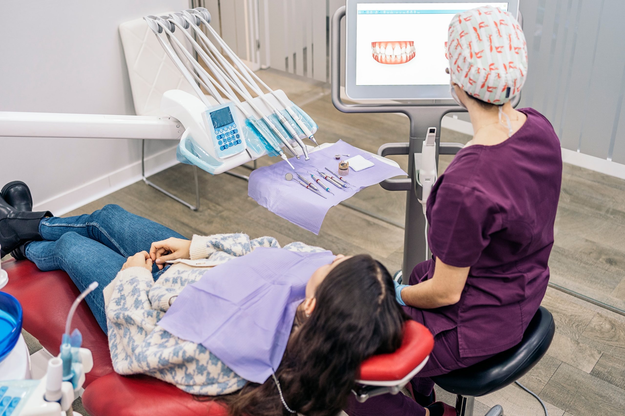 An Orthodontist using an iTero scanner for complex cases