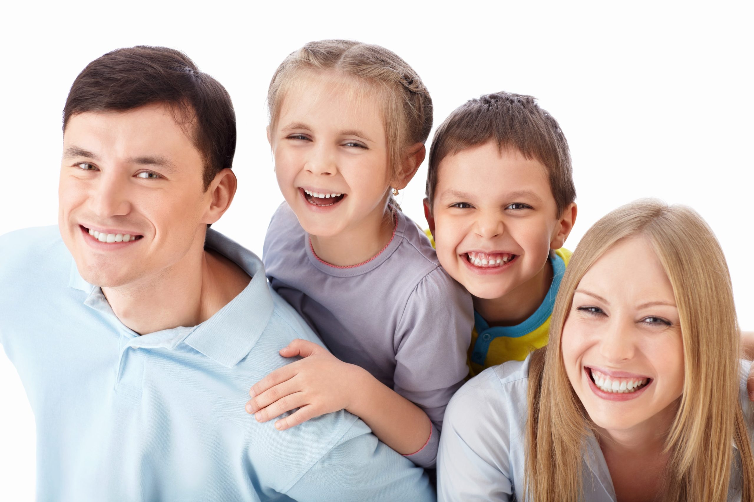 Family smiling with two kids 