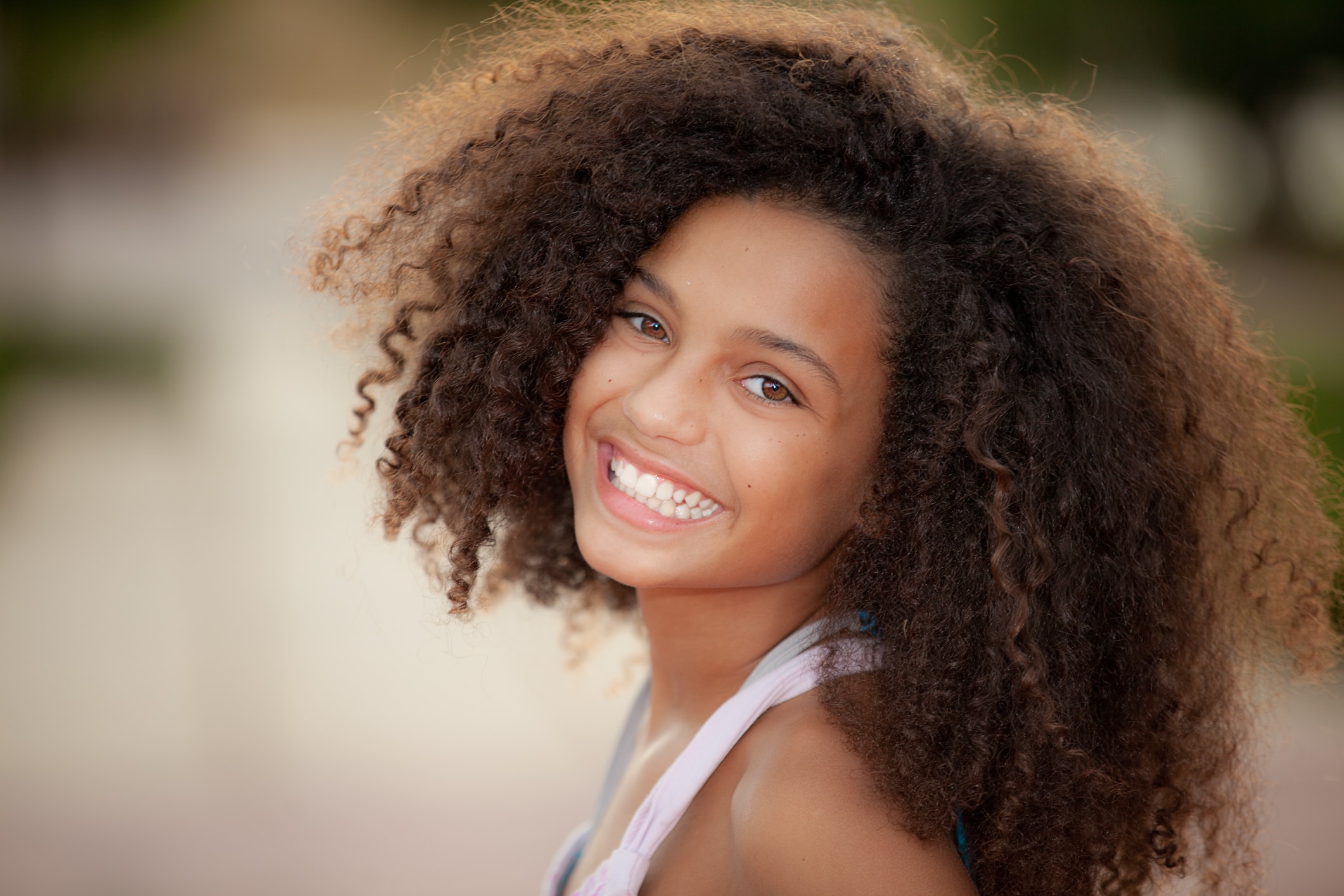 photo of young child smiling who is going to receive early treatment