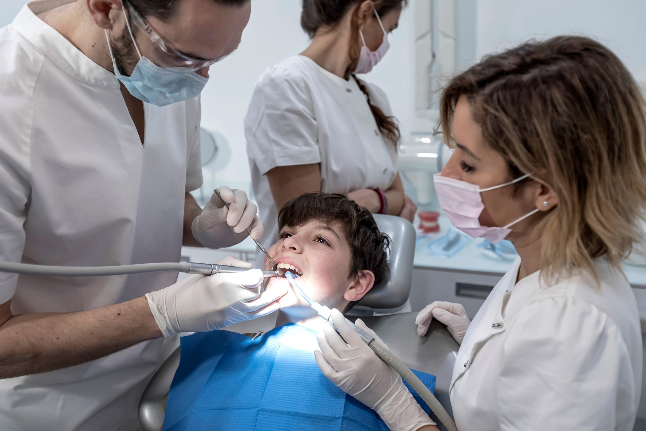 A child's cavity that has been treated by his orthodontist.