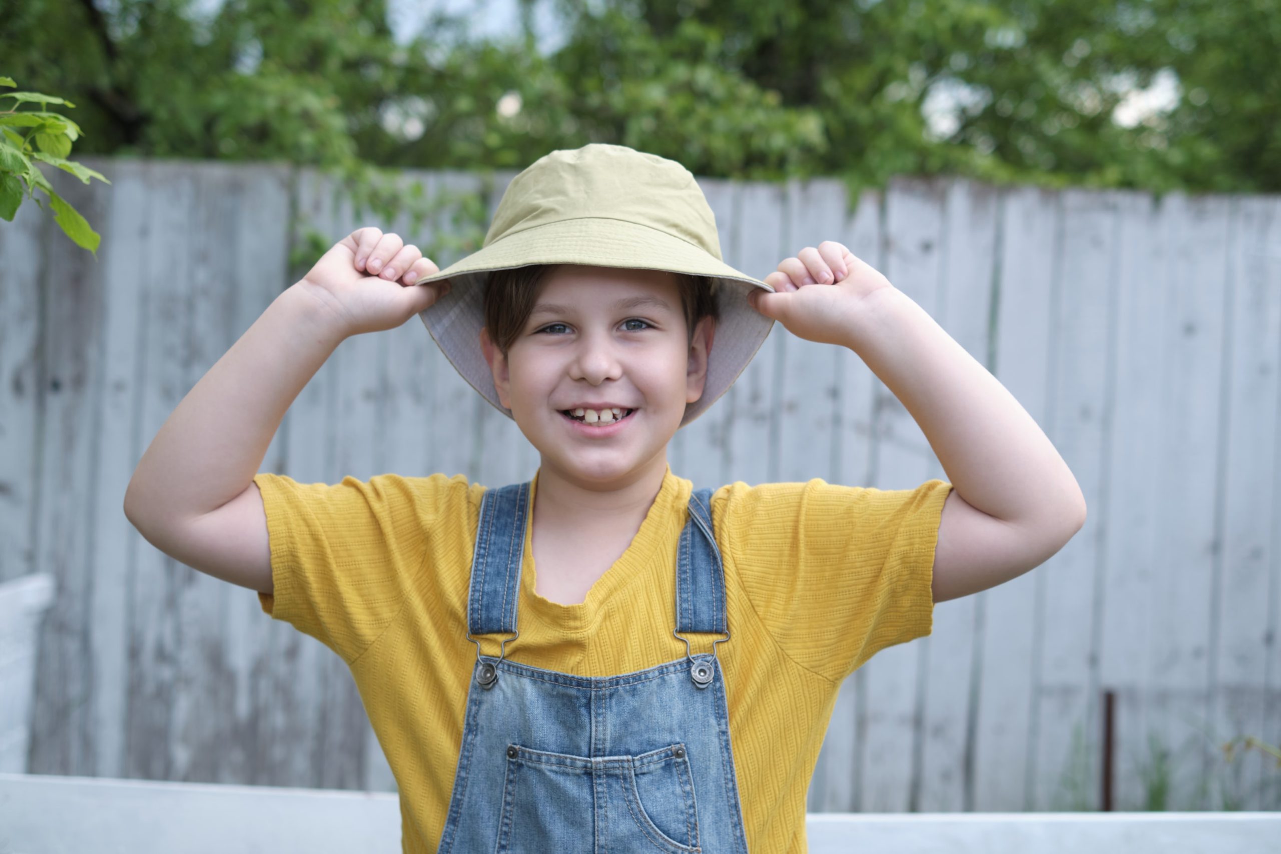 Child smiling with crooked front teeth 