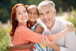 Family of 3 ready to start orthodontic care