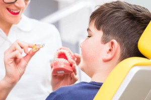 kid getting orthodontic treatment