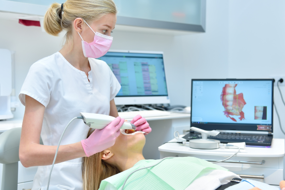 patient getting a 3d dental scan to start invisalign treatment