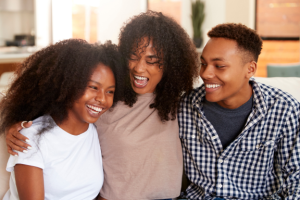 smiling mom and teens who now know how long does invisalign take