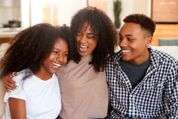 smiling mom and teens who now know how long does invisalign take 