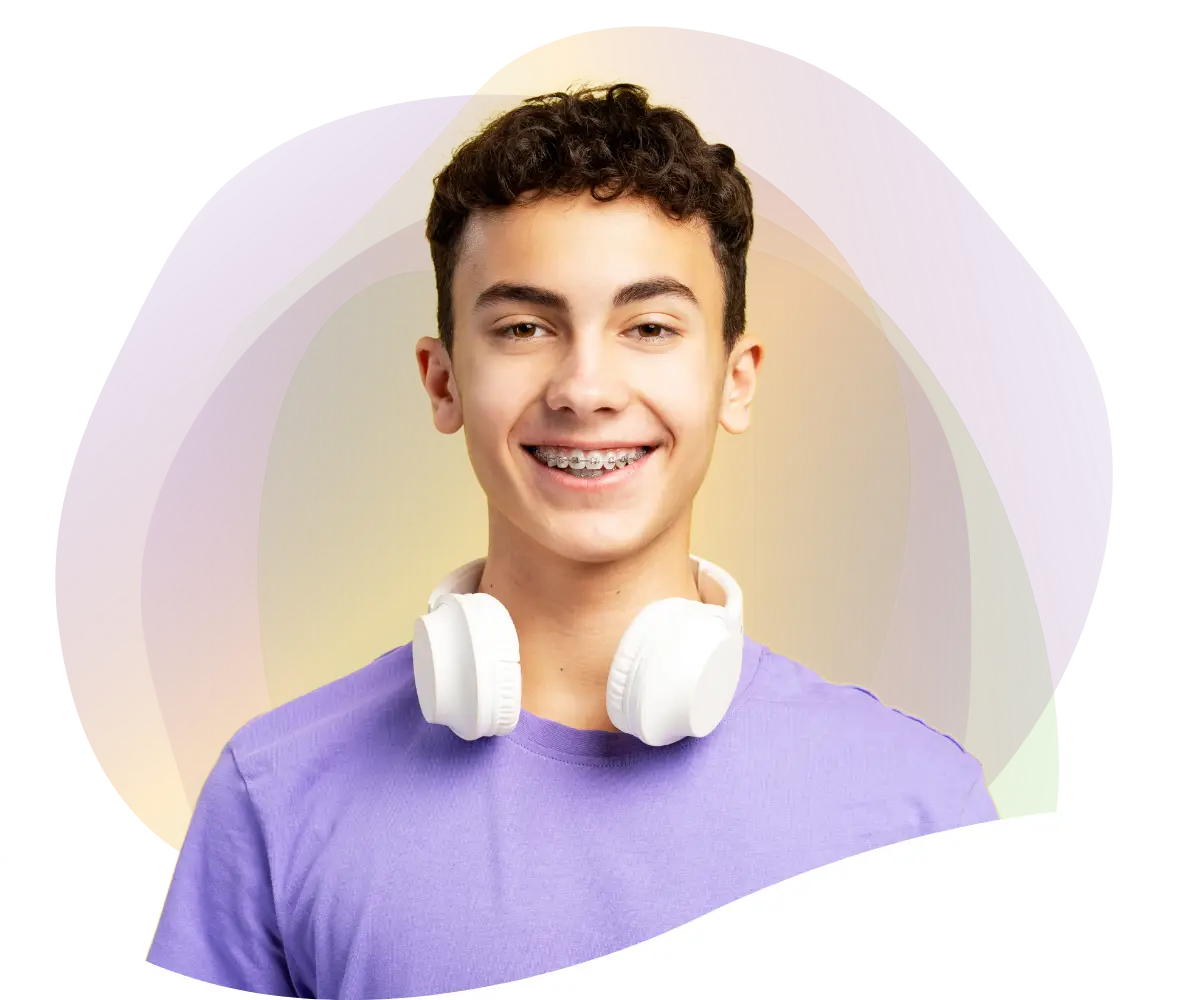 teenage boy smiling with metal braces