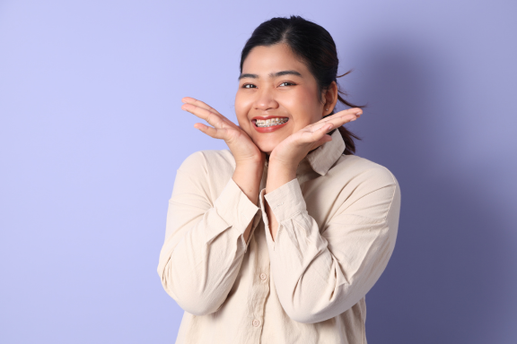 Young adult who got braces for overbite
