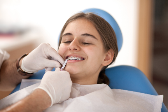 Teenager getting braces for the first time