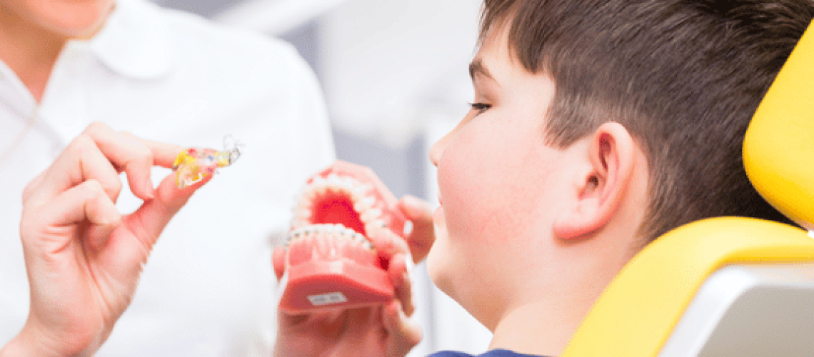 kid getting orthodontic treatment